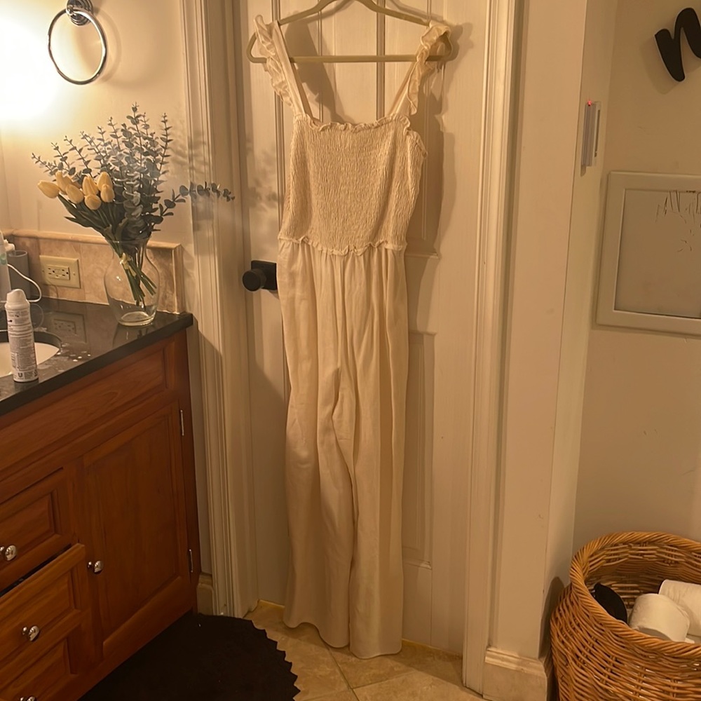 Jumpsuit size L . Ruffle straps